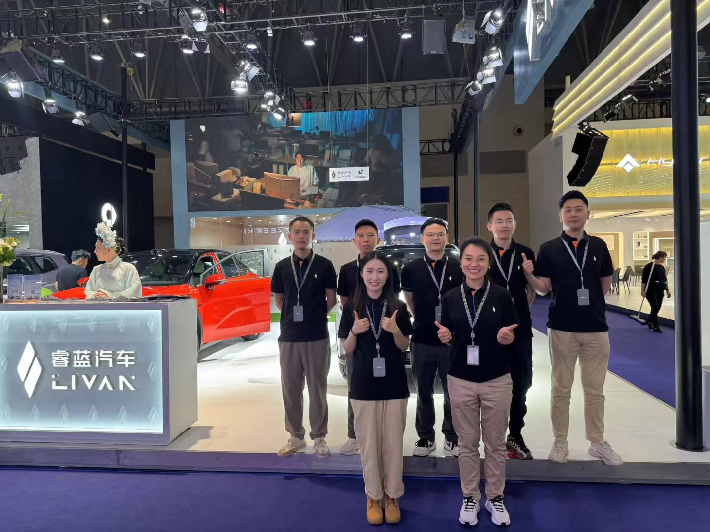 Yuzhiyan team at LIVAN auto show booth